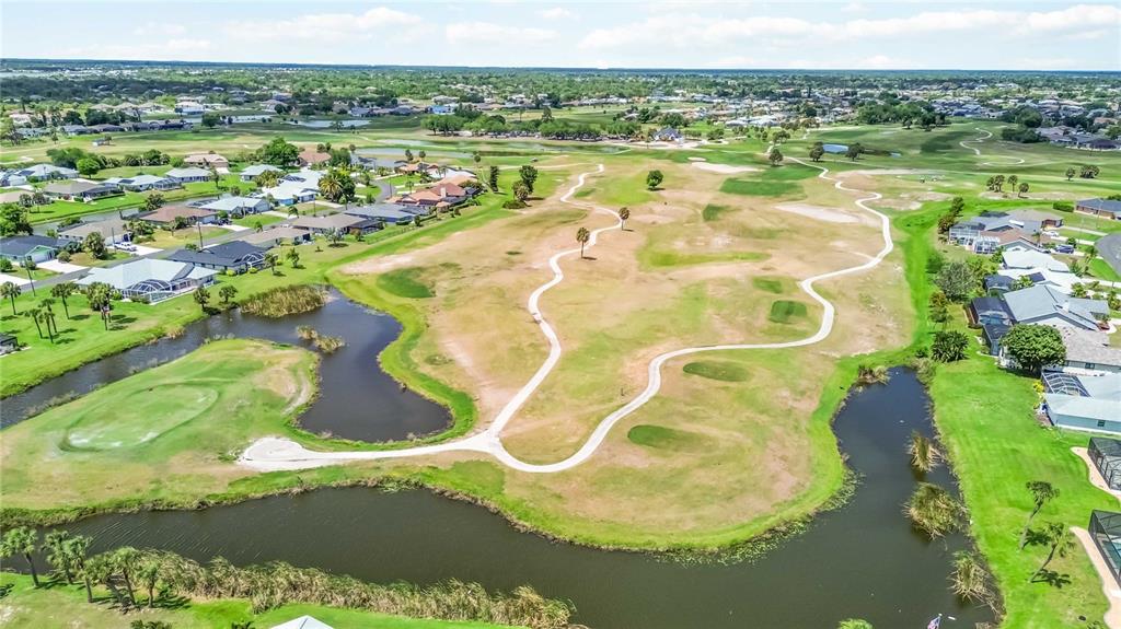 48 Bunker Road Rotonda West, FL 33947 - Photo 50 of 59 a view of a lake with a mountain
