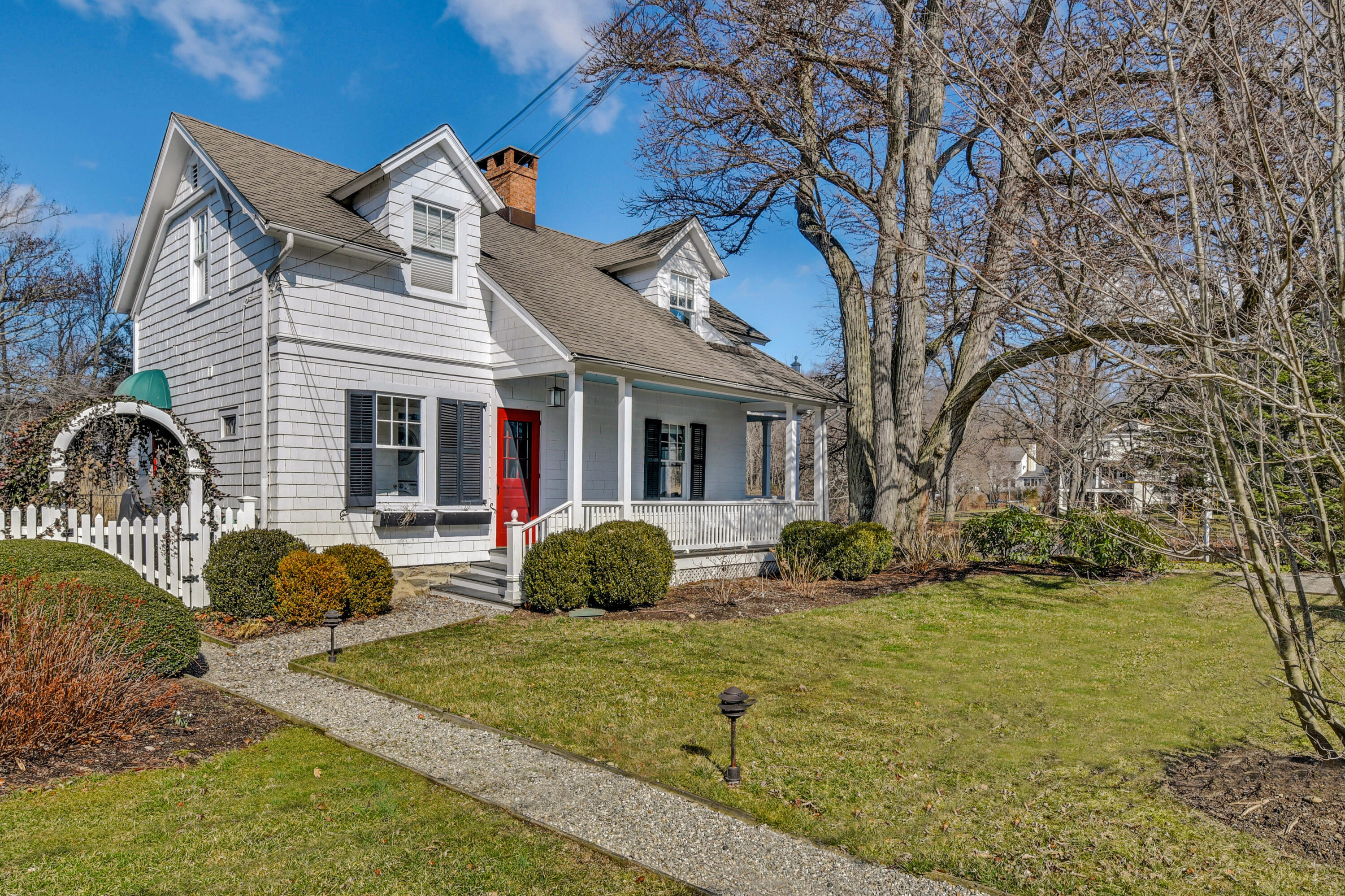 35 Old Farm Road Darien, CT 06820 - Photo 1 of 26 a front view of a house with garden