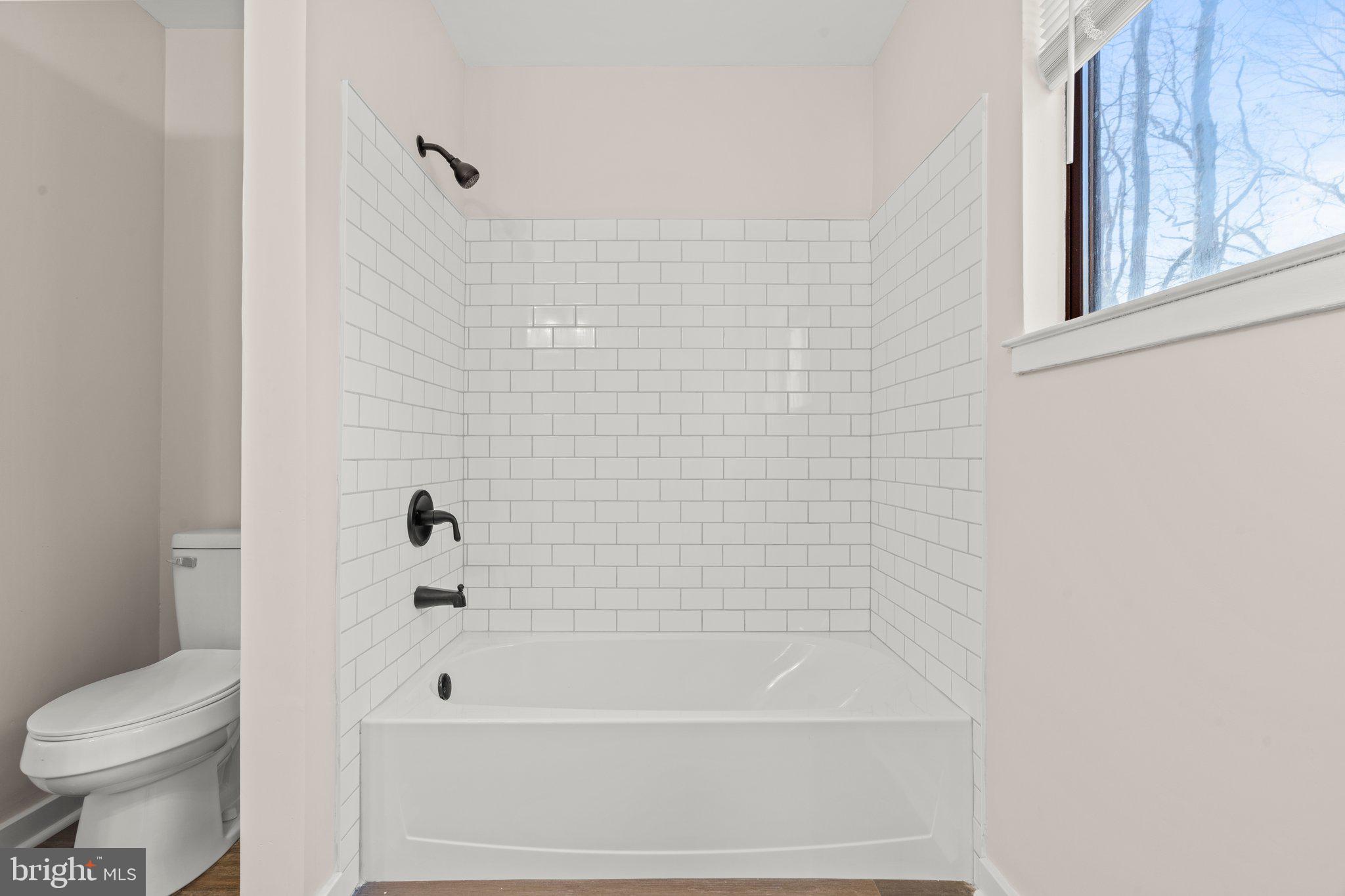 1210 Thackery Court Sicklerville, NJ 08081 - Photo 12 of 18 a bathroom with a bathtub and a toilet