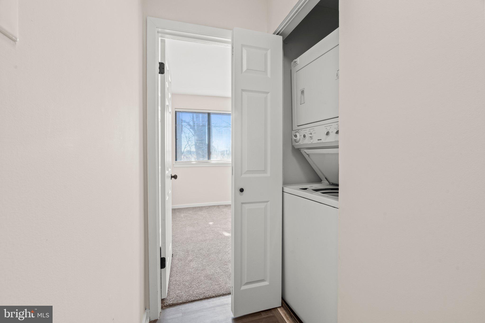 1210 Thackery Court Sicklerville, NJ 08081 - Photo 15 of 18 a view of hallway with sink and a mirror