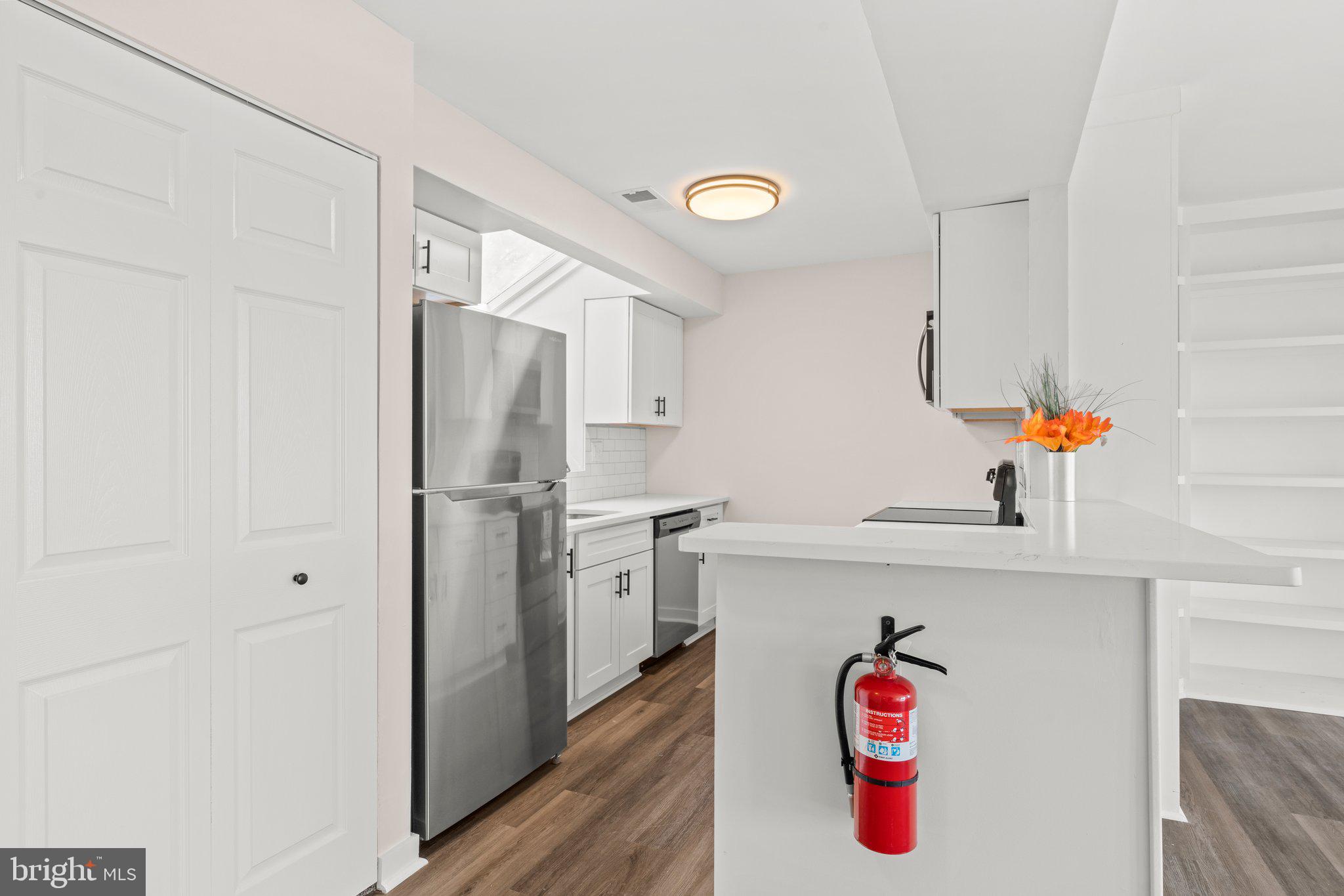 1210 Thackery Court Sicklerville, NJ 08081 - Photo 6 of 18 a kitchen with a refrigerator and a sink