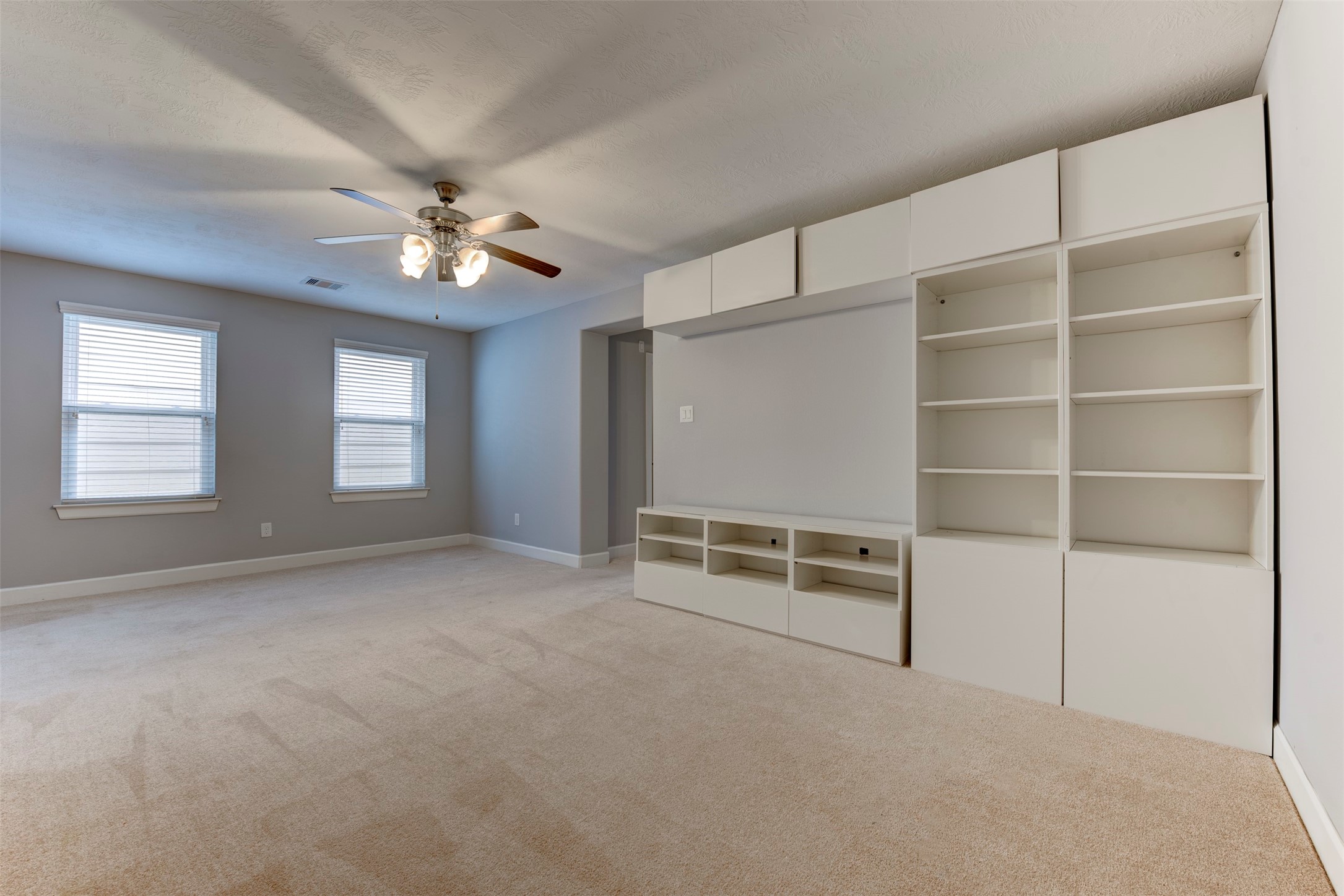 1811 Wichita Street, Unit A Houston, TX 77004 - Photo 16 of 36 a view of an empty room with a window
