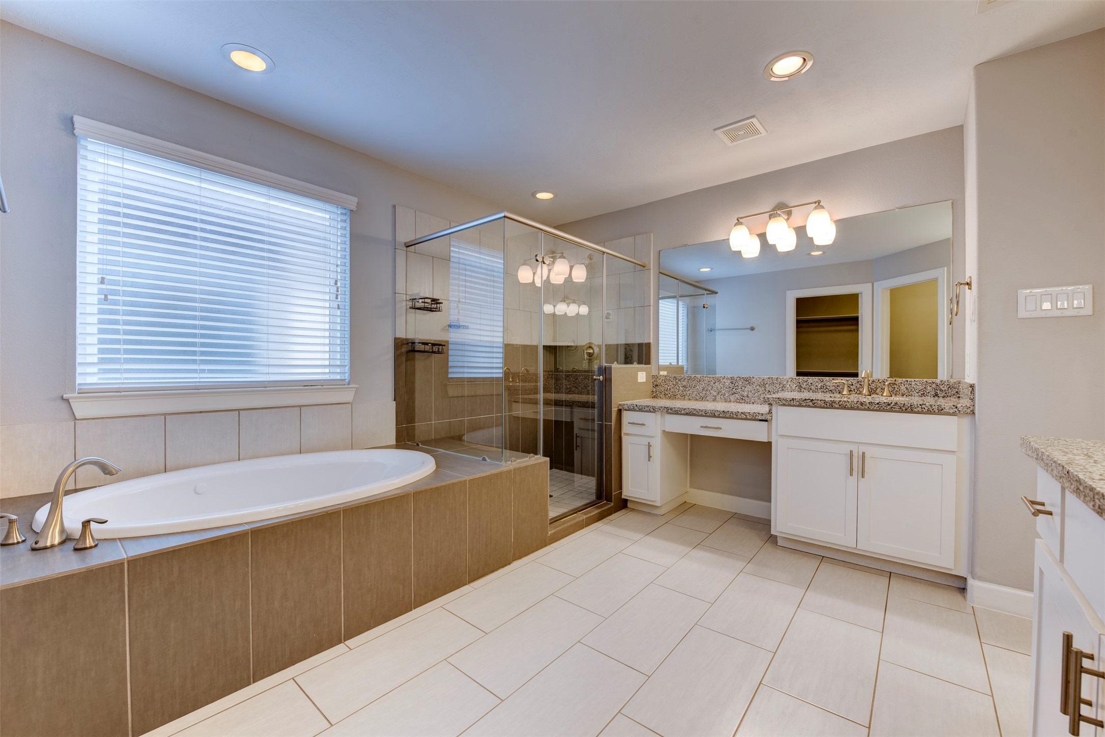 1811 Wichita Street, Unit A Houston, TX 77004 - Photo 19 of 36 a large kitchen with a sink and cabinets