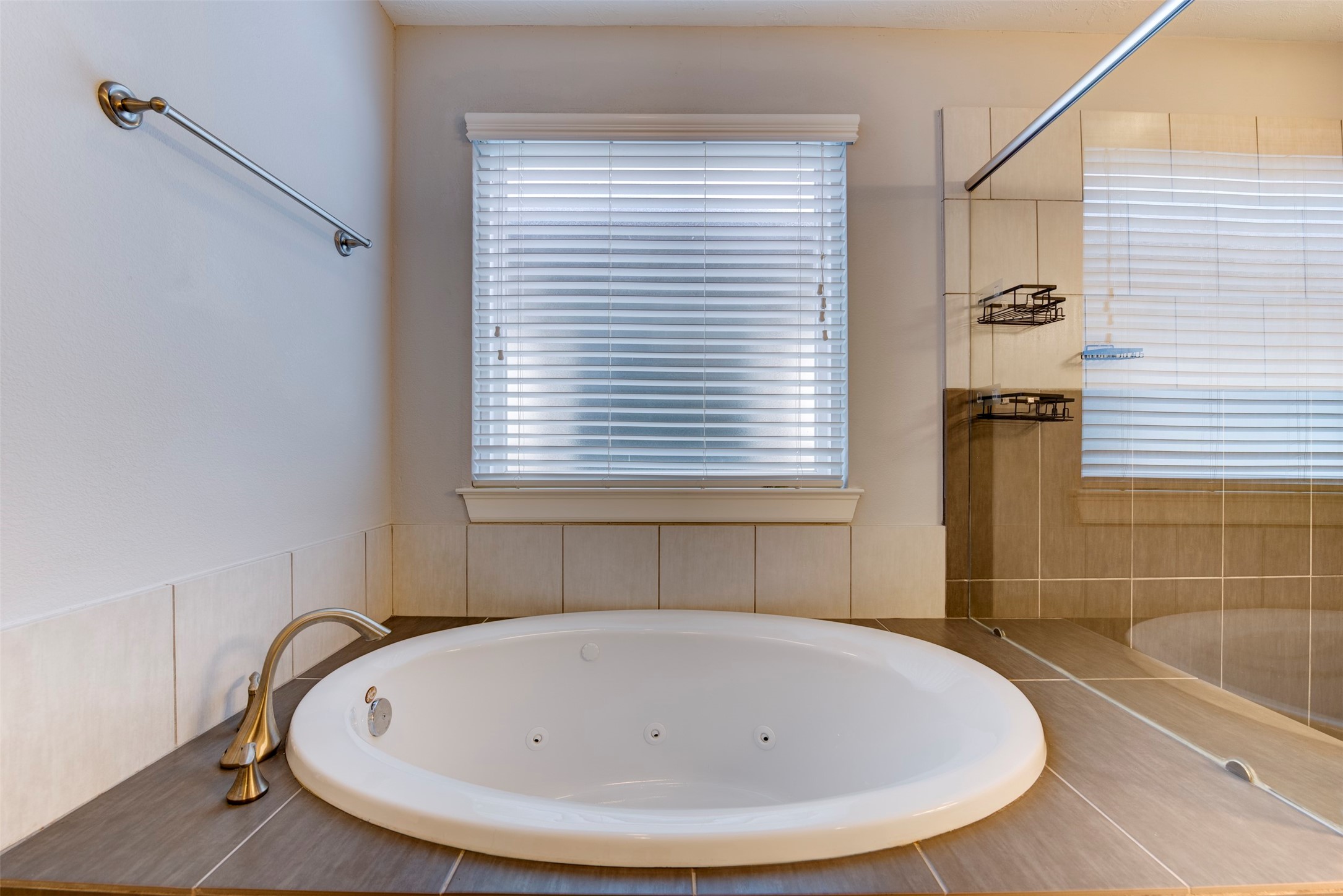 1811 Wichita Street, Unit A Houston, TX 77004 - Photo 20 of 36 a bathroom with a white bath tub and a window