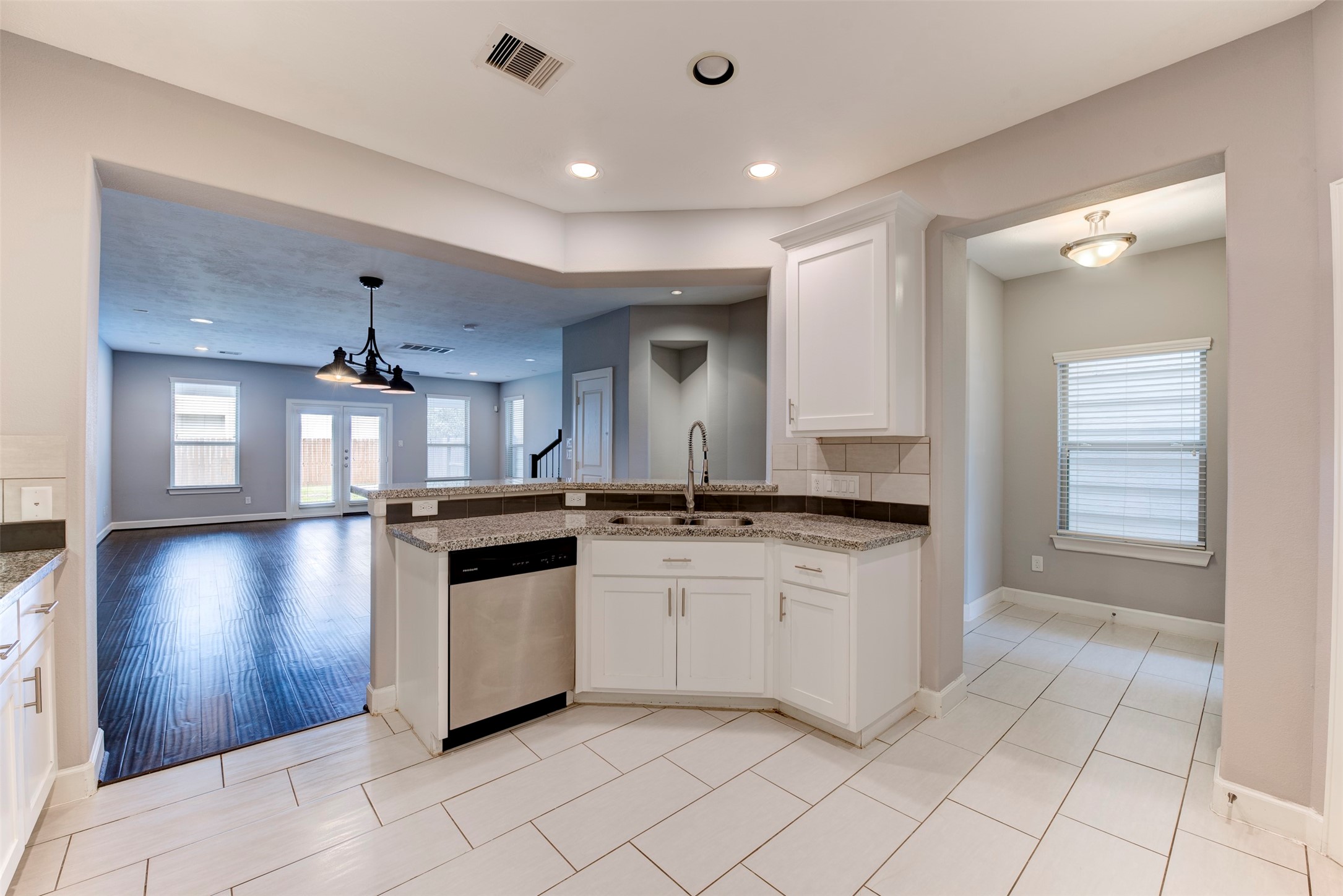 1811 Wichita Street, Unit A Houston, TX 77004 - Photo 8 of 36 a kitchen with stainless steel appliances granite countertop a stove and a sink