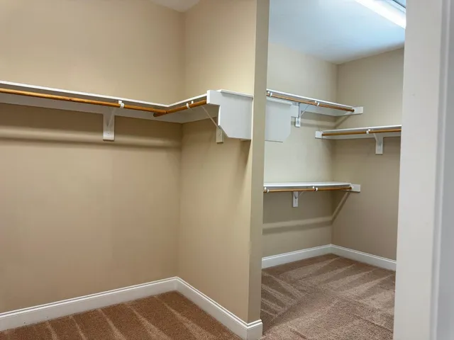 a view of walk in closet with window