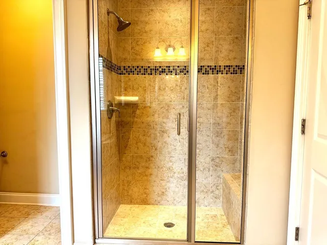 a view of room with window and stairs