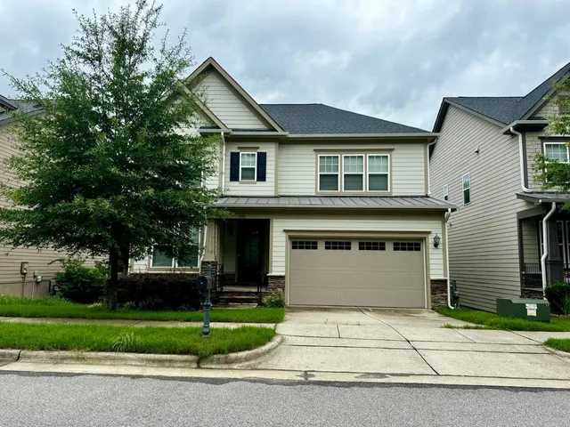 a kitchen with granite countertop a sink and cabinets