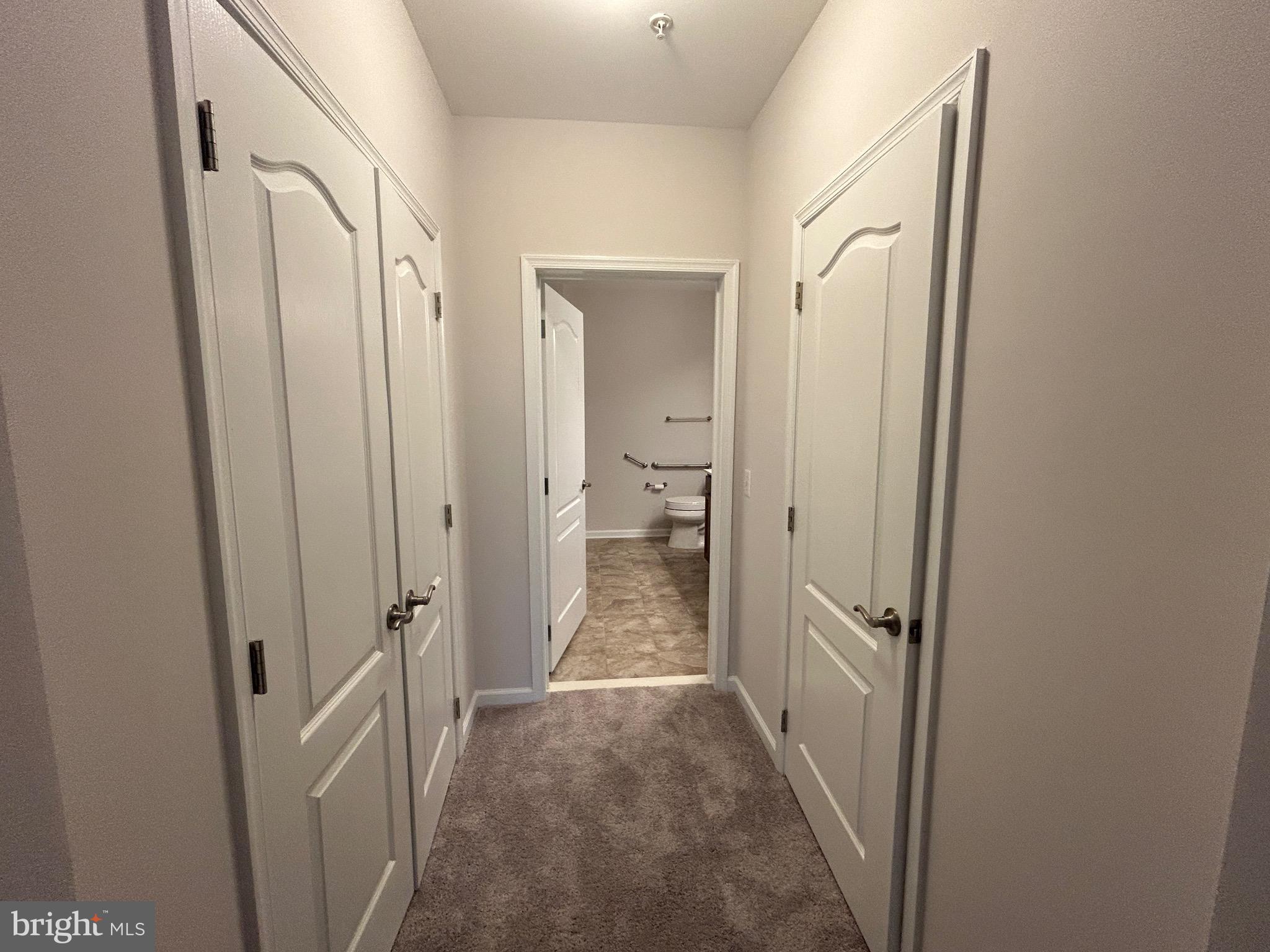 1406 Wigeon Way, Unit 306 Gambrills, MD 21054 - Photo 14 of 32 Primary Bedroom Closets