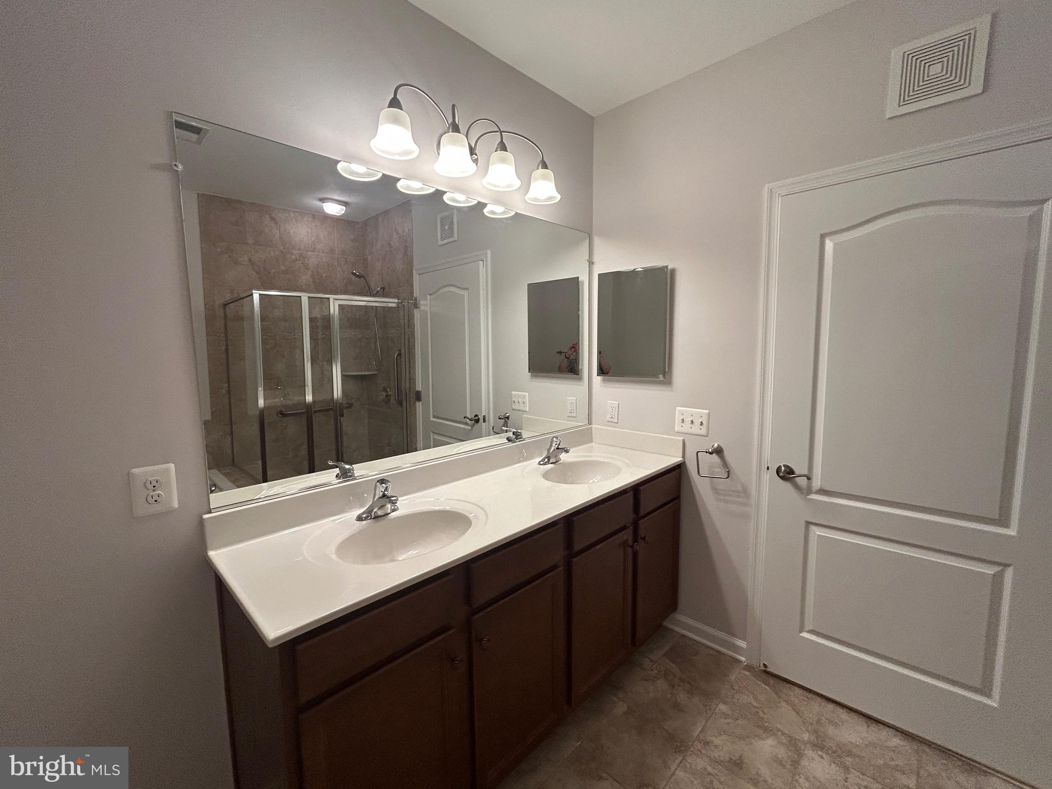 1406 Wigeon Way, Unit 306 Gambrills, MD 21054 - Photo 18 of 32 Primary Bathroom with Double Sinks