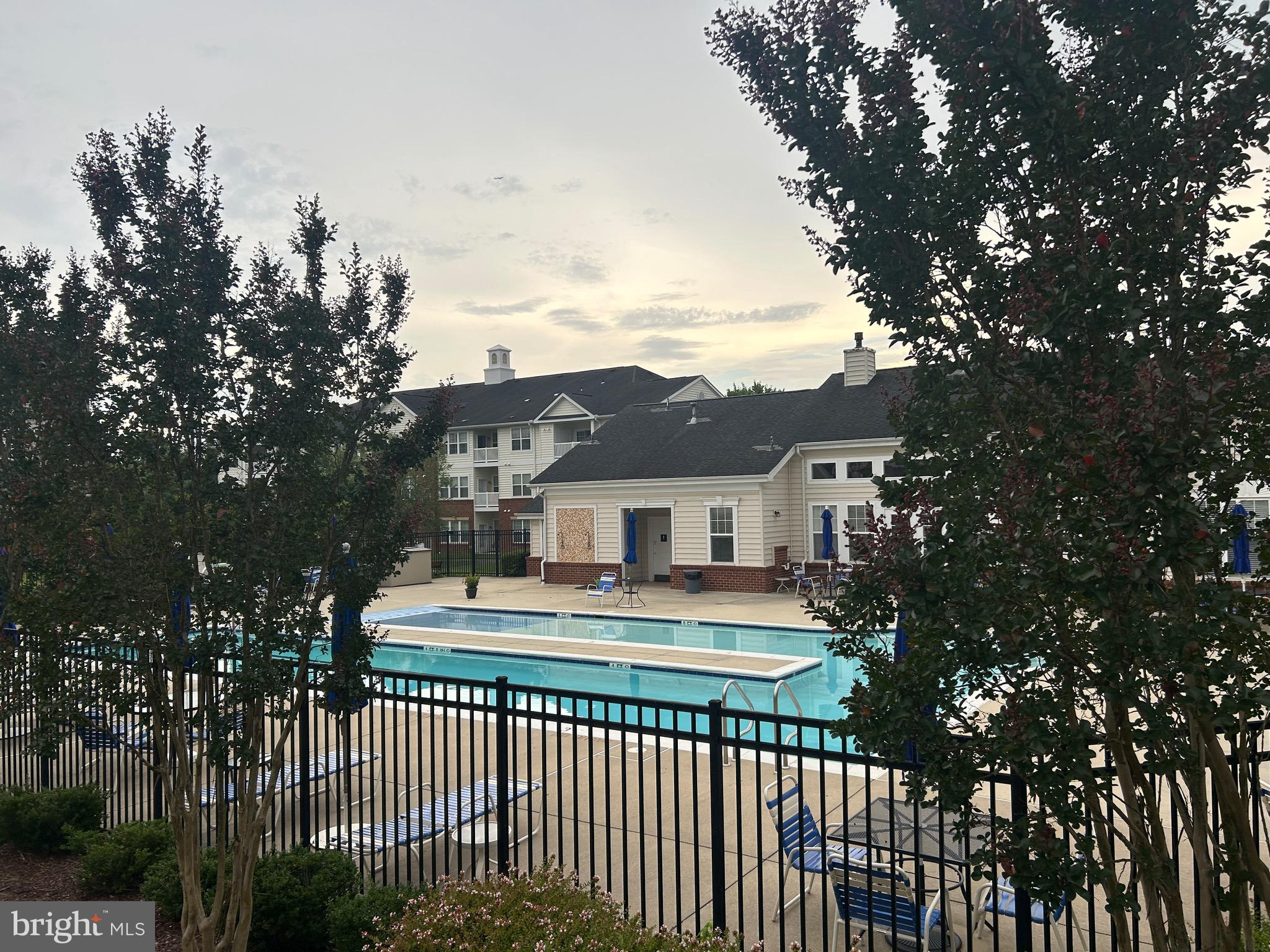 1406 Wigeon Way, Unit 306 Gambrills, MD 21054 - Photo 30 of 32 Outdoor Pool and Clubhouse