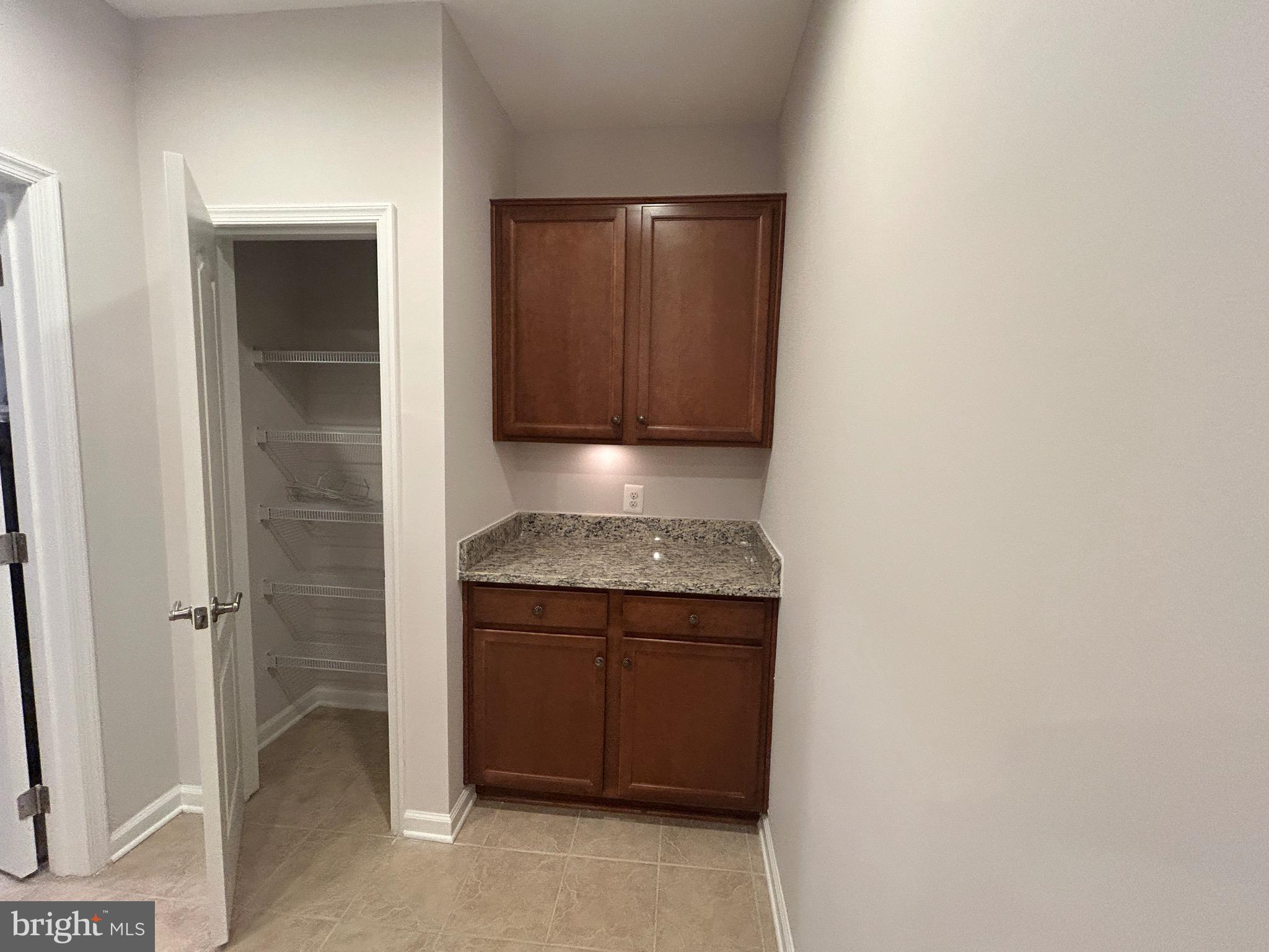1406 Wigeon Way, Unit 306 Gambrills, MD 21054 - Photo 9 of 32 Pantry and Extra Cabinet Space