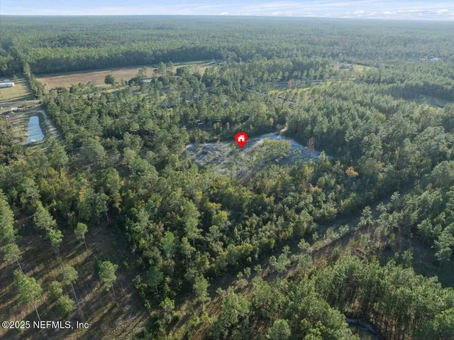 a view of a and covered with trees