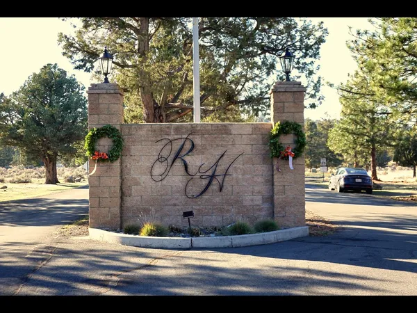 a view of a street with sign board
