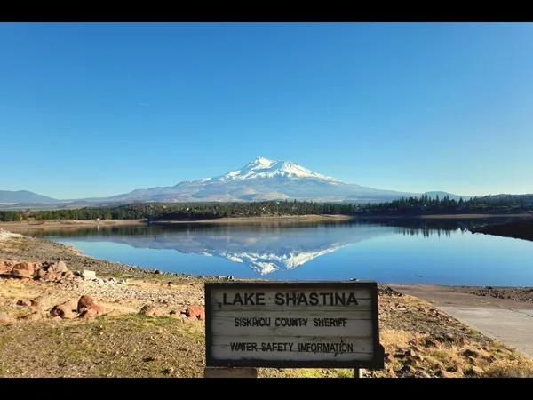 a view of ocean with sunset