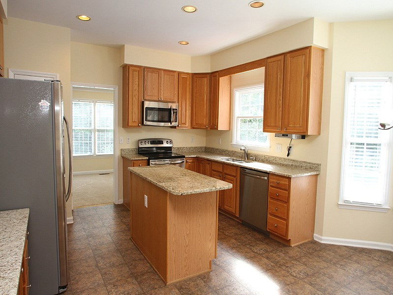 2305 Kendricks Court Raleigh, NC 27613 - Photo 5 of 23 Kitchen has granite, stainless steel appliances - updated in 2013. Kitchen