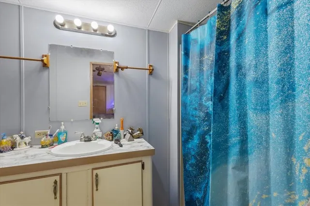 a bedroom with a bed and a closet