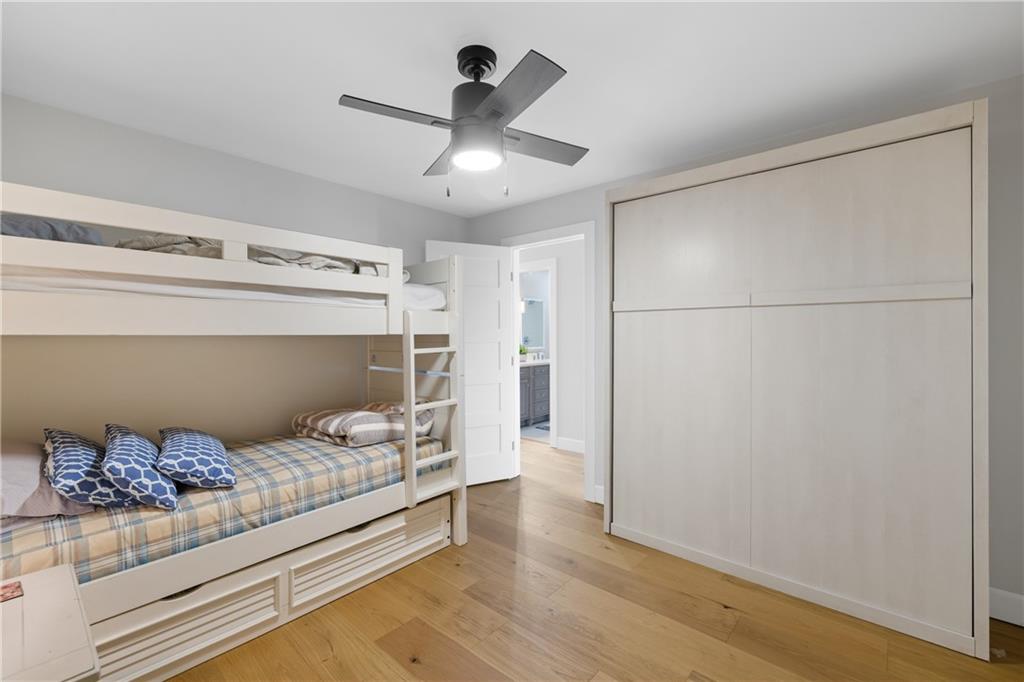 1631 Arrowhead Road Greensboro, GA 30642 - Photo 23 of 83 a bedroom with a bed and a ceiling fan