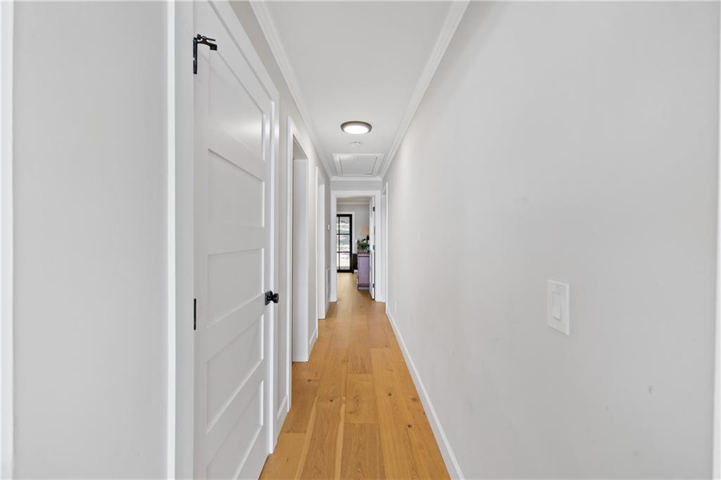 1631 Arrowhead Road Greensboro, GA 30642 - Photo 26 of 83 a view of a hallway with wooden floor