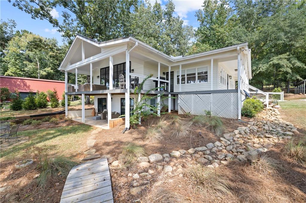 1631 Arrowhead Road Greensboro, GA 30642 - Photo 68 of 83 a view of a house with a yard