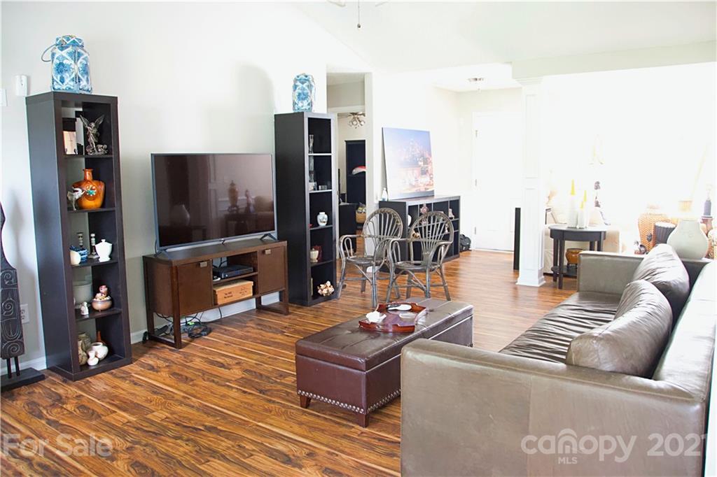 13415 Philip Michael Road Huntersville, NC 28078 - Photo 17 of 30 a living room with furniture and a flat screen tv