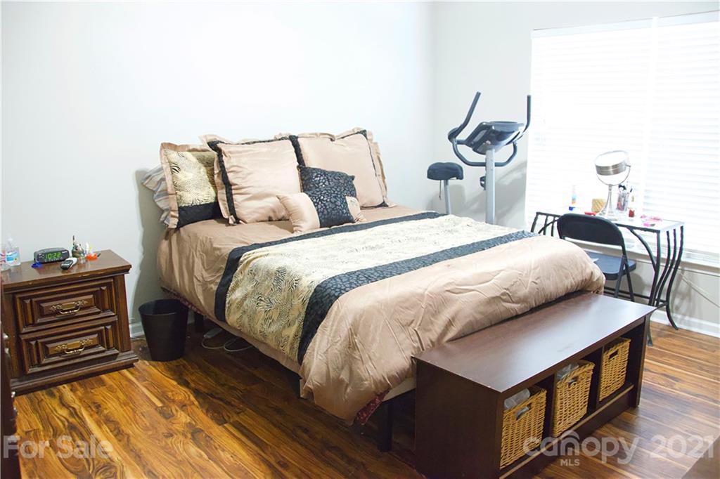 13415 Philip Michael Road Huntersville, NC 28078 - Photo 19 of 30 a bedroom with double bed and a dresser