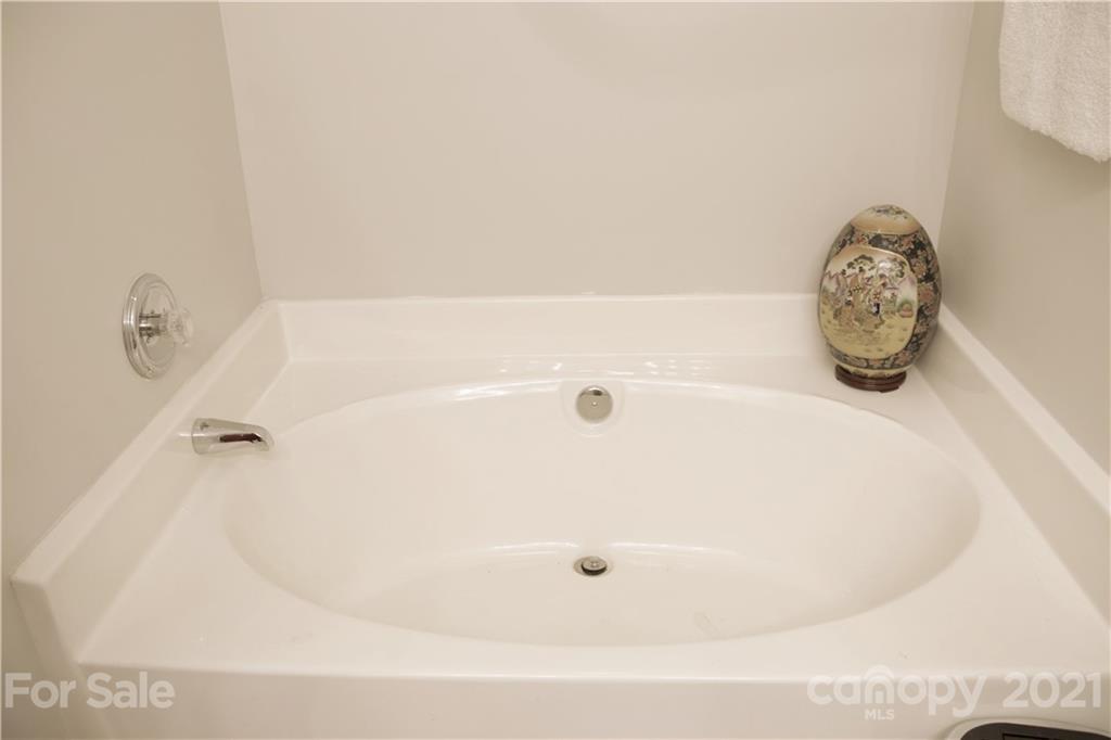 13415 Philip Michael Road Huntersville, NC 28078 - Photo 21 of 30 a bathroom with a tub