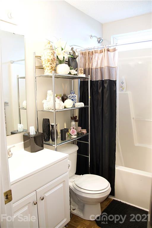 13415 Philip Michael Road Huntersville, NC 28078 - Photo 26 of 30 a bathroom with a sink a toilet and shower