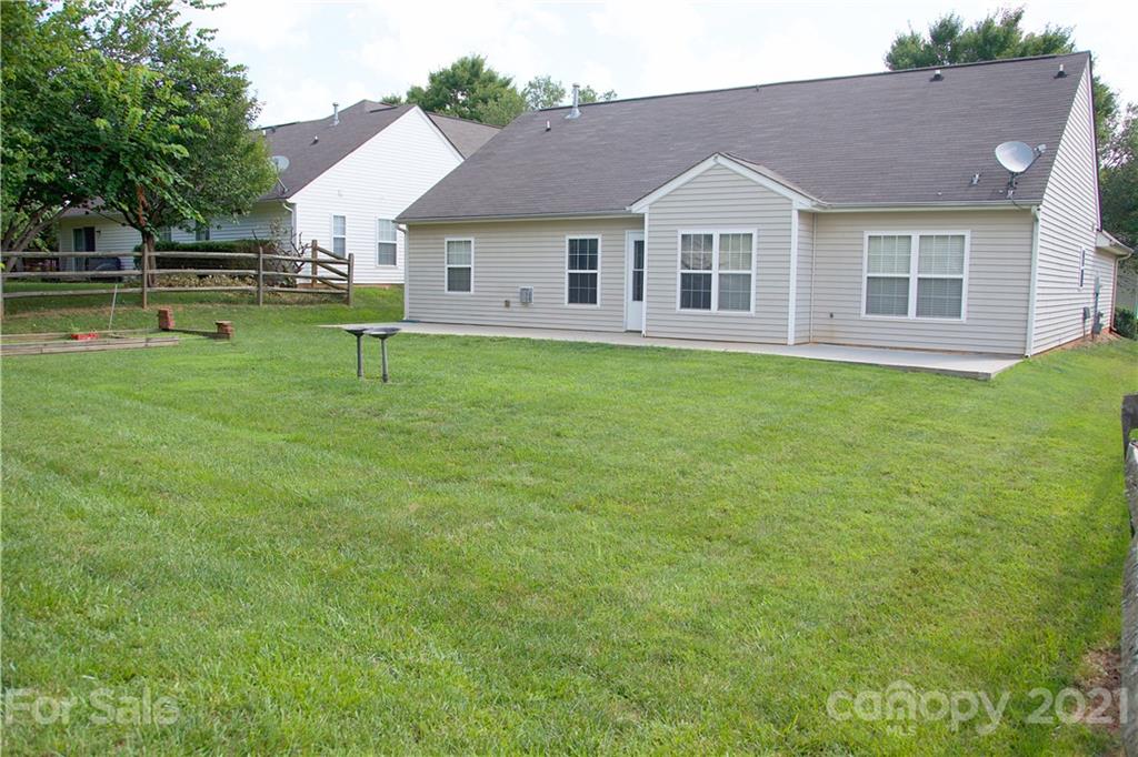 13415 Philip Michael Road Huntersville, NC 28078 - Photo 5 of 30 a front view of a house with a garden