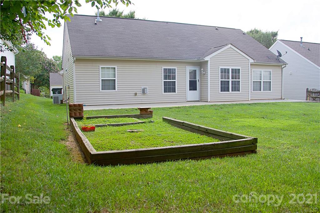 13415 Philip Michael Road Huntersville, NC 28078 - Photo 6 of 30 a view of a house with a backyard