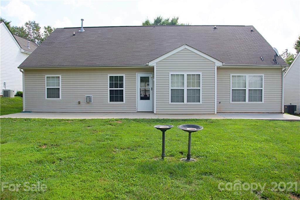 13415 Philip Michael Road Huntersville, NC 28078 - Photo 7 of 30 a backyard of a house with seating area