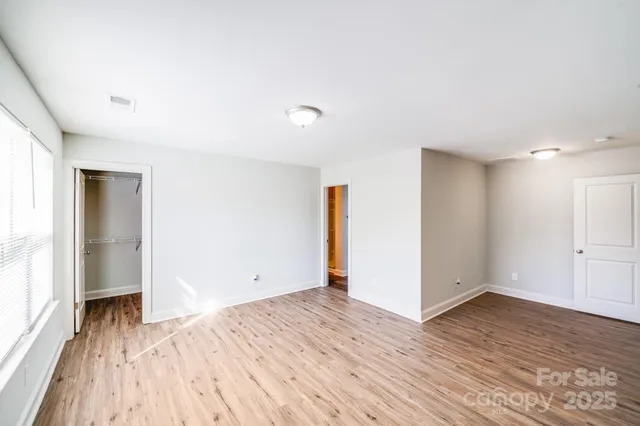 a view of an empty walk in closet
