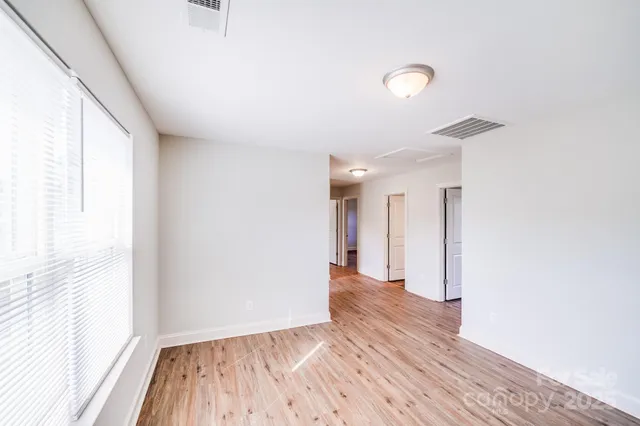 a view of a room that has a window in it