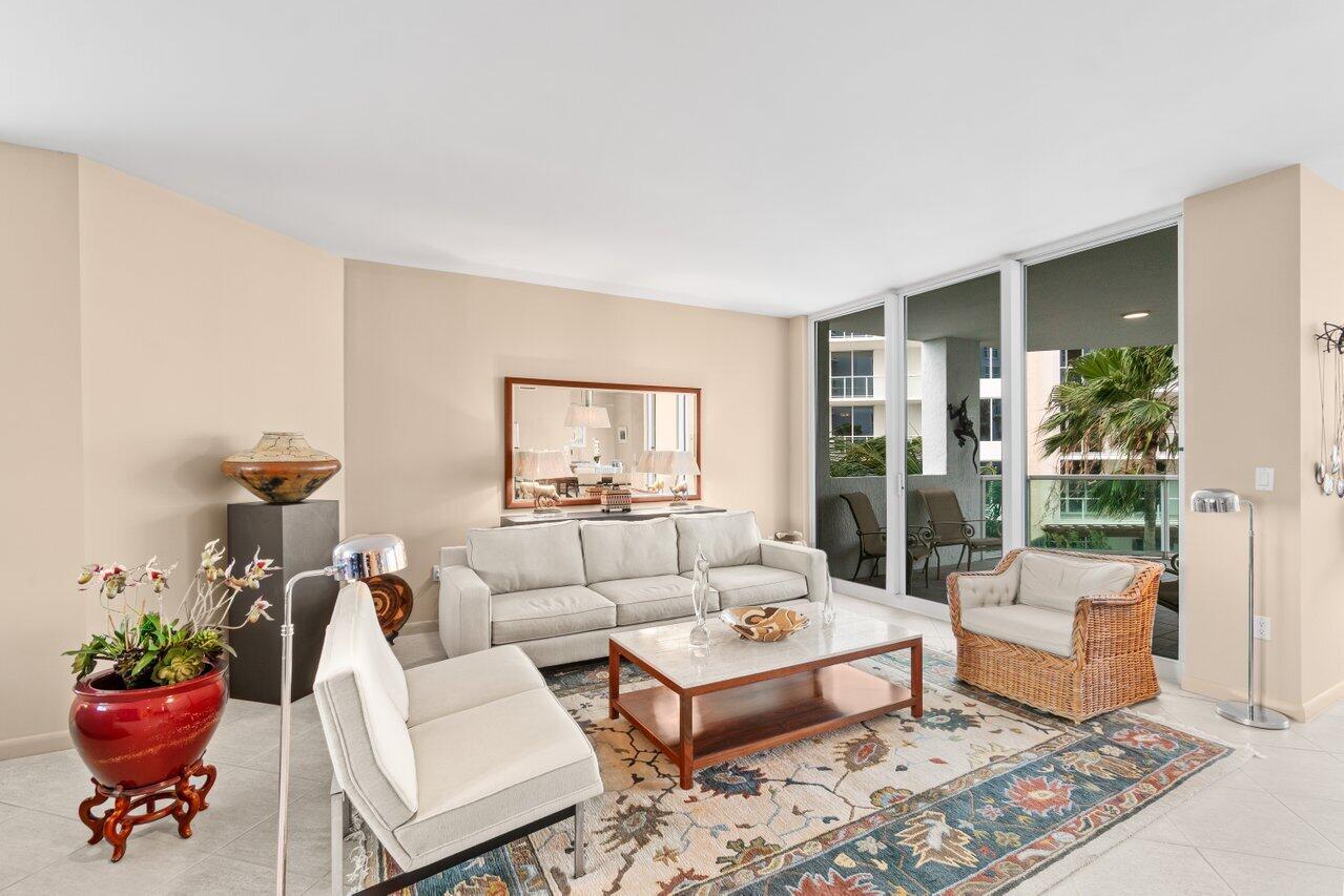 500 Southeast Mizner Boulevard, Unit A411 Boca Raton, FL 33432 - Photo 11 of 67 a living room with furniture and wooden floor