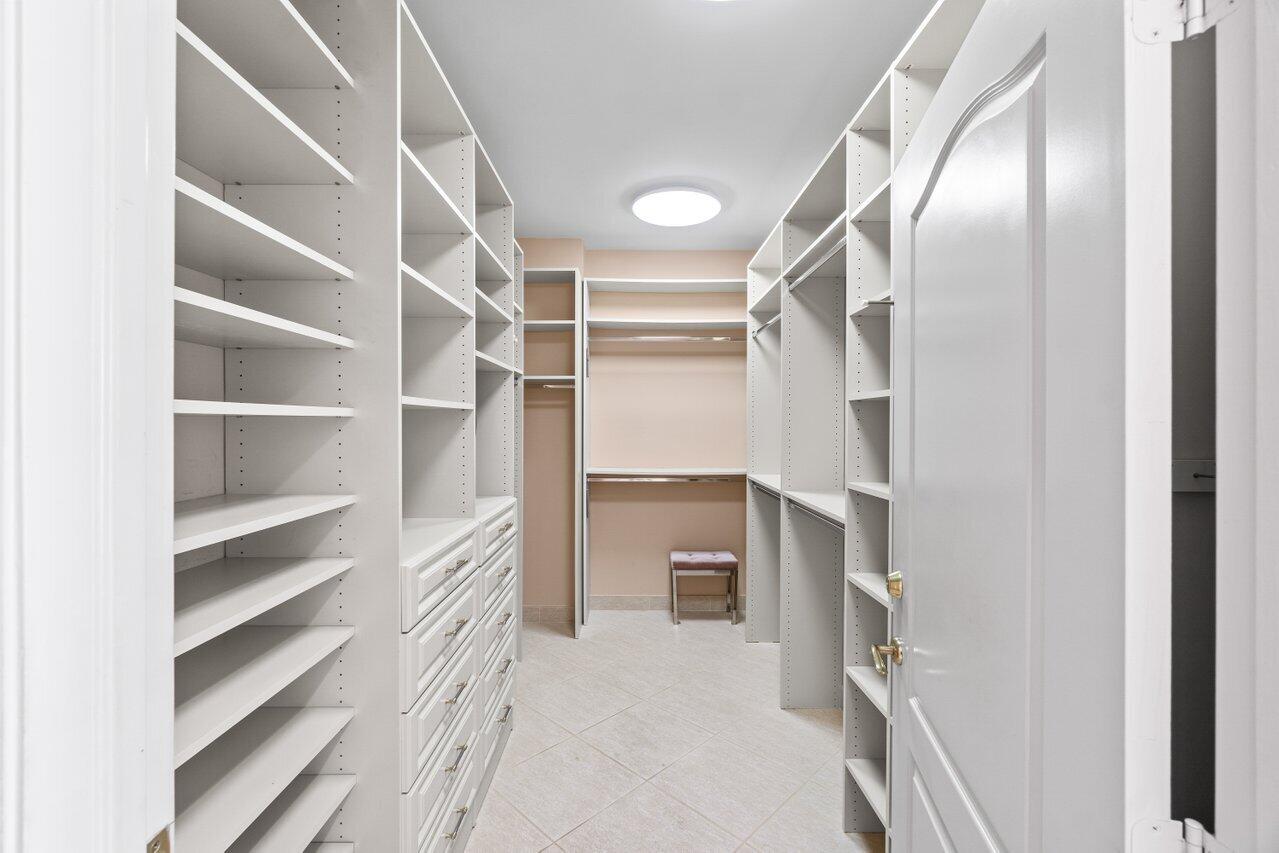 500 Southeast Mizner Boulevard, Unit A411 Boca Raton, FL 33432 - Photo 27 of 67 a view of walk in closet with empty racks