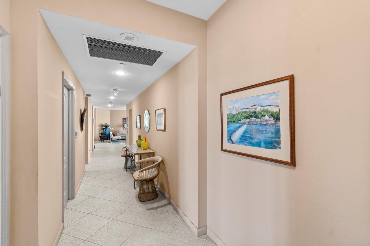 500 Southeast Mizner Boulevard, Unit A411 Boca Raton, FL 33432 - Photo 31 of 67 a dining room with furniture and a painting