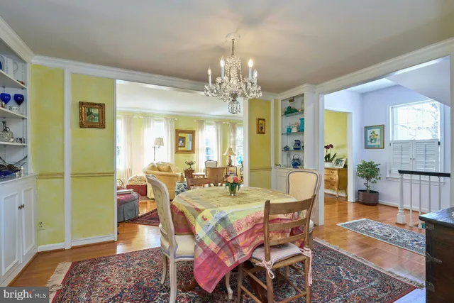 a kitchen with a sink a stove and a refrigerator
