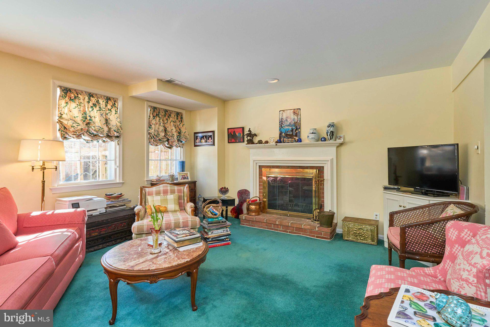 3528 Hamlet Place, Unit 808 Chevy Chase, MD 20815 - Photo 23 of 57 21 x 30 great room with fireplace, patio entrance.