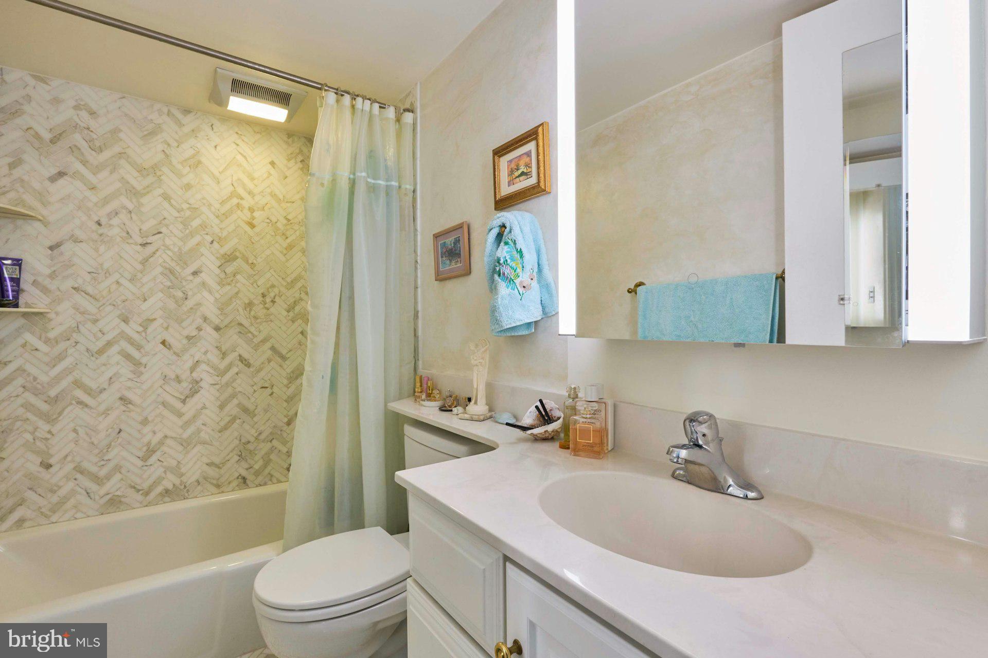 3528 Hamlet Place, Unit 808 Chevy Chase, MD 20815 - Photo 37 of 57 Full baths with lighted medicine cabinets & outlet