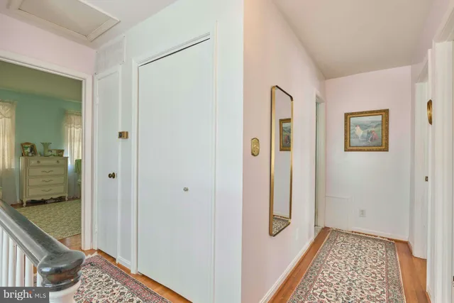 a bedroom with bed and window