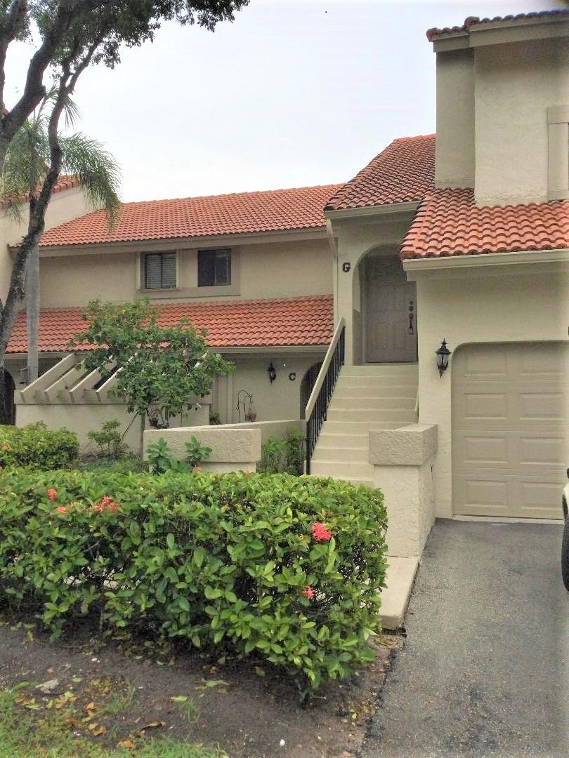 5640 Coach House Circle, Unit C Boca Raton, FL 33486 - Photo 2 of 30 Coach House Bldg Front (2)