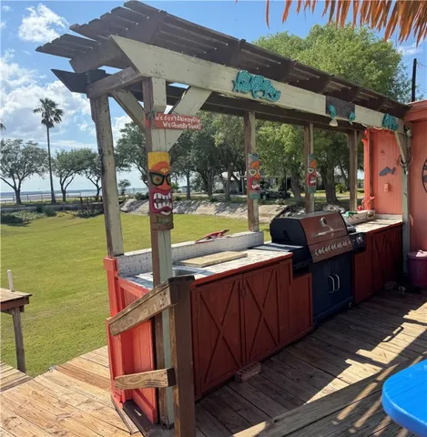 a view of an outdoor dining space with furniture