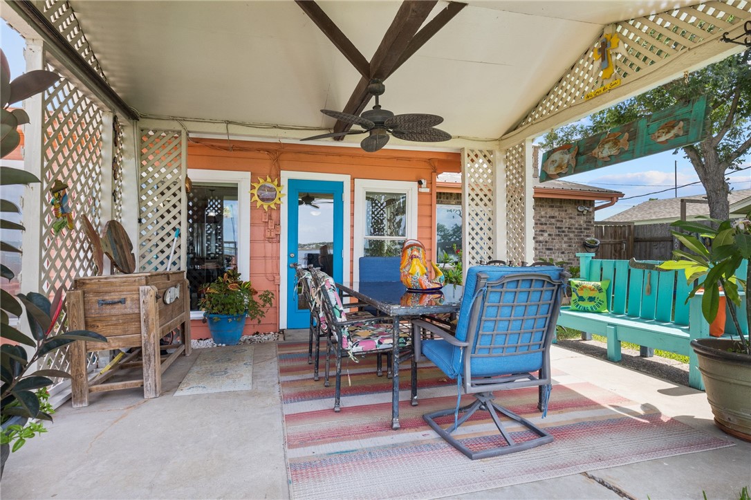 116 Sunset Drive Mathis, TX 78368 - Photo 20 of 32 a view of a patio with a table and chairs