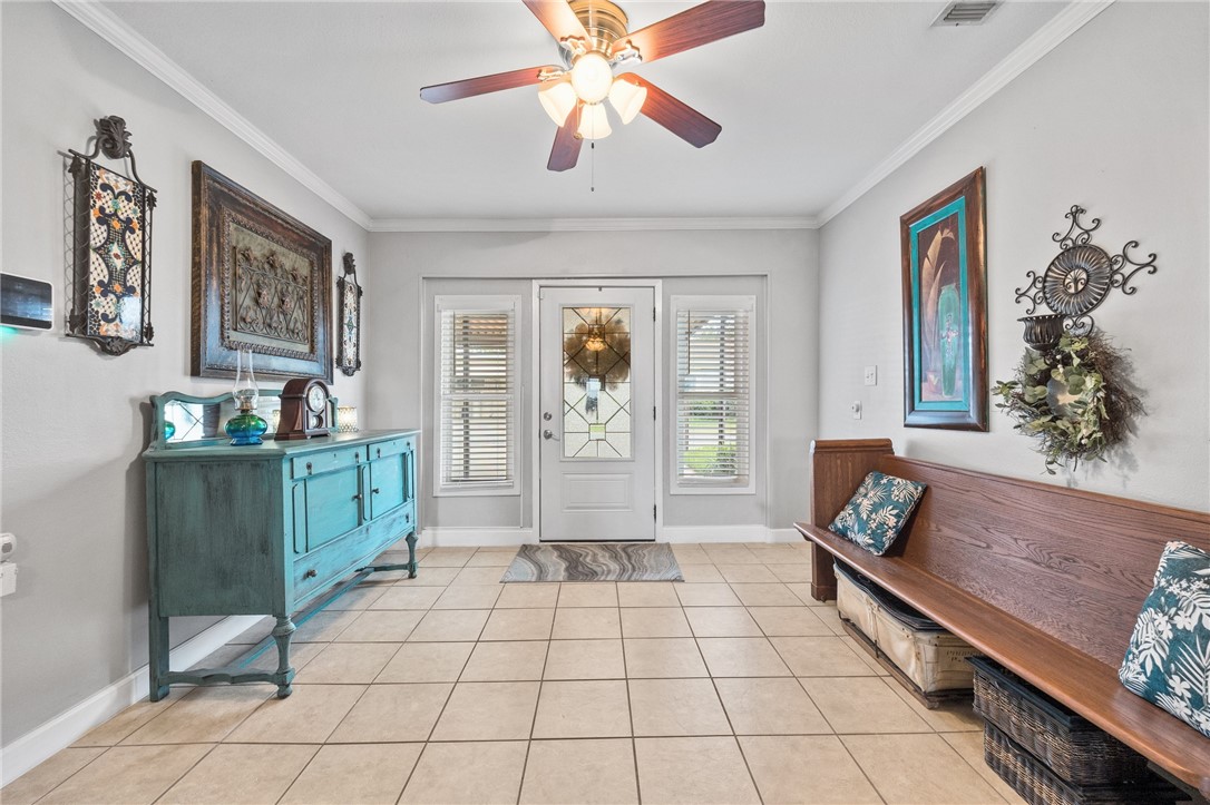 116 Sunset Drive Mathis, TX 78368 - Photo 2 of 32 a living room with furniture and a window