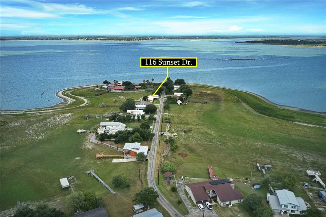 116 Sunset Drive Mathis, TX 78368 - Photo 22 of 32 an aerial view of a residential houses with outdoor space