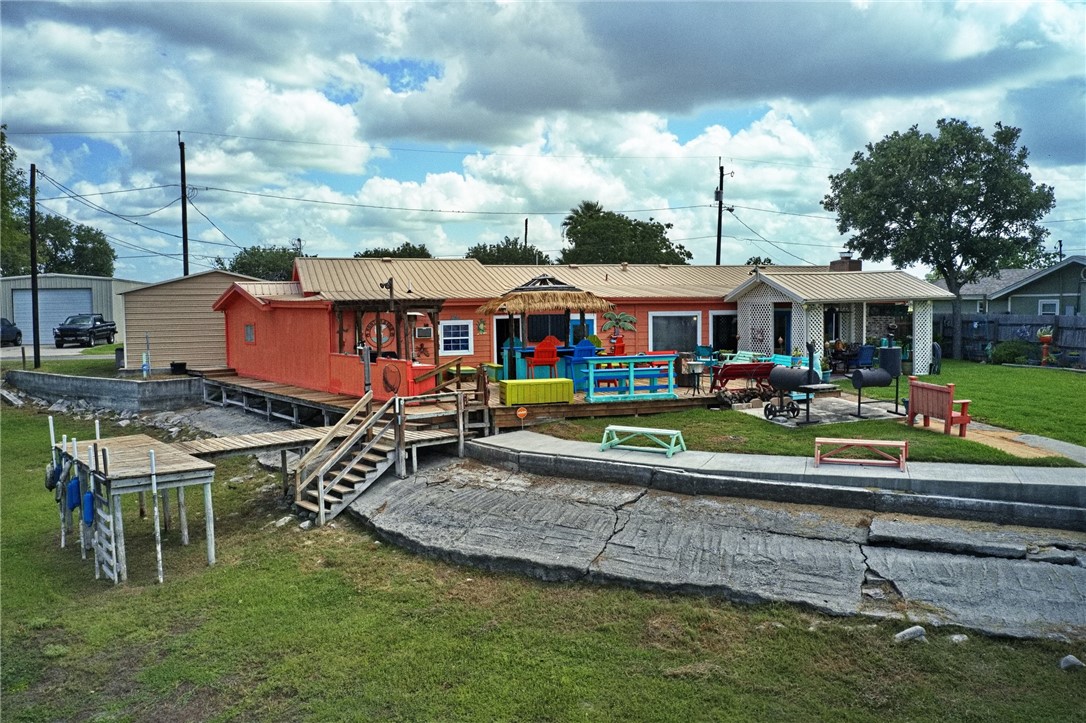 116 Sunset Drive Mathis, TX 78368 - Photo 26 of 32 a view of an ocean house and outdoor space