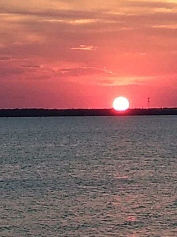 116 Sunset Drive Mathis, TX 78368 - Photo 30 of 32 a view of a lake