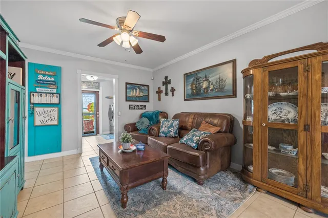 a living room with furniture and a window
