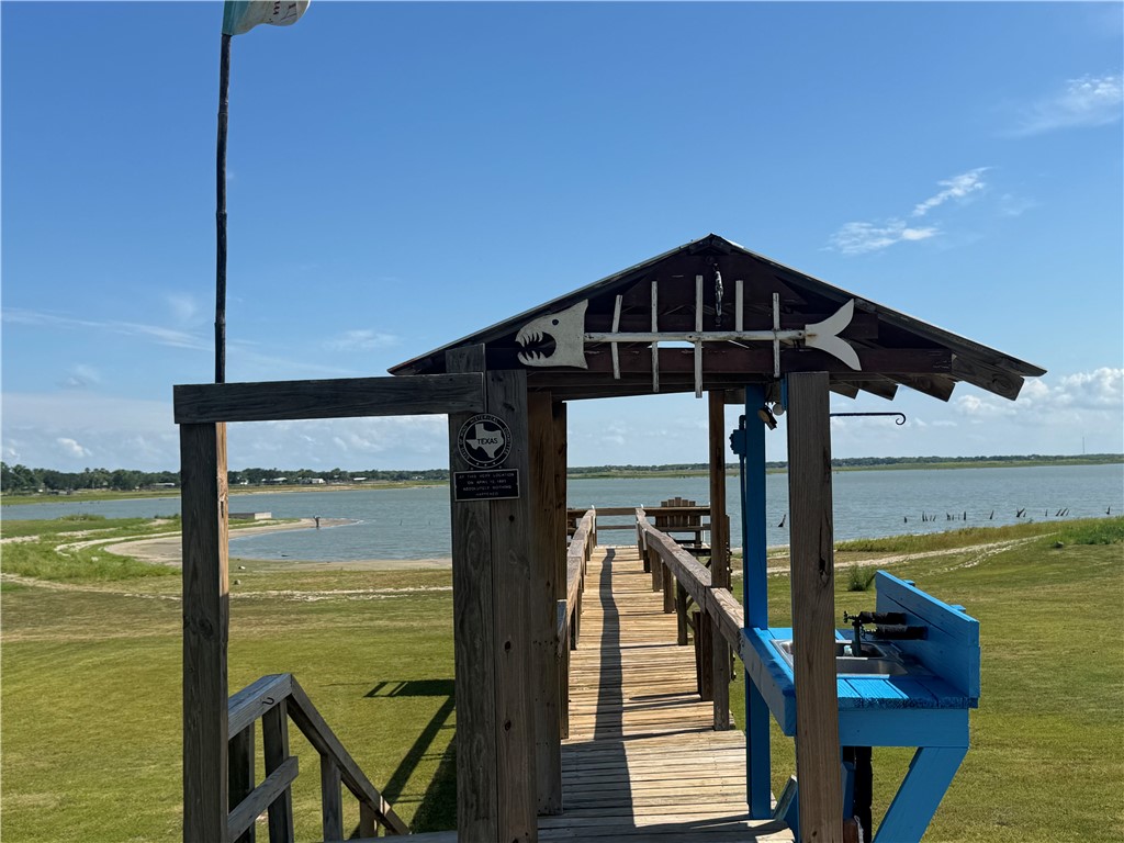 116 Sunset Drive Mathis, TX 78368 - Photo 32 of 32 a front view of a house with ocean view