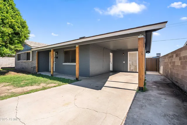 a house view with a backyard space